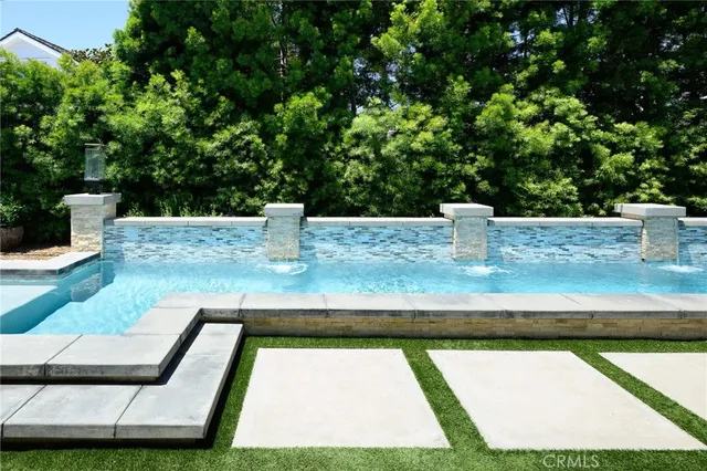 a view of yard from outdoor seating area