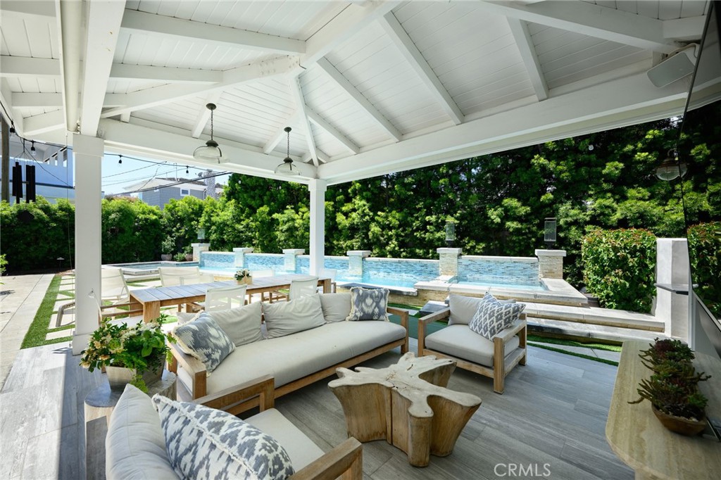 519 Signal Road Newport Beach, CA 92663 - Photo 32 of 40 a outdoor living space with furniture and garden view