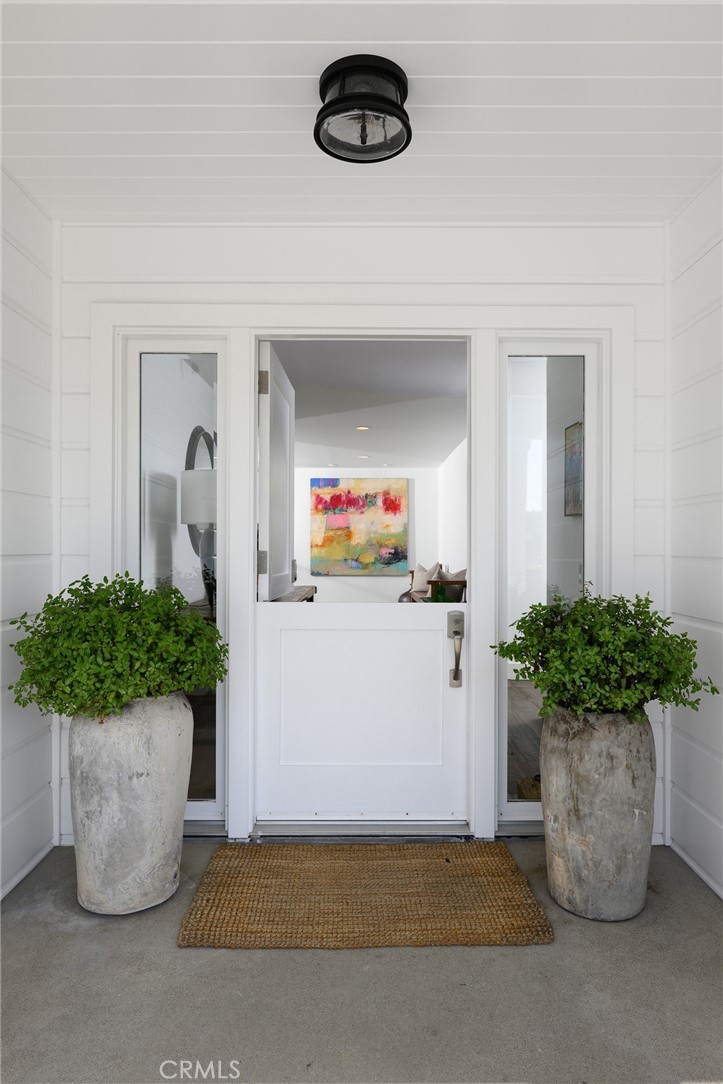 519 Signal Road Newport Beach, CA 92663 - Photo 5 of 40 a view of a room with a potted plant