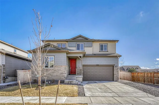 a front view of a house with entertaining space