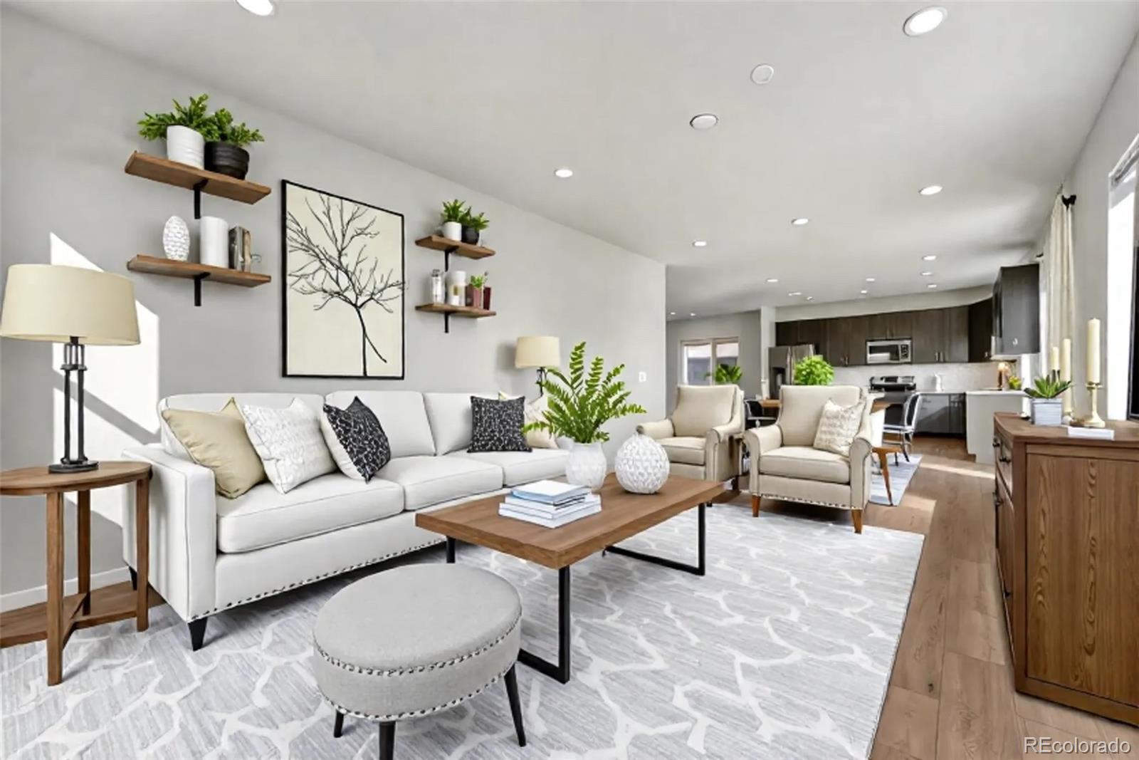 15902 Stringhalt Way Parker, CO 80134 - Photo 19 of 48 a living room with furniture and a potted plant