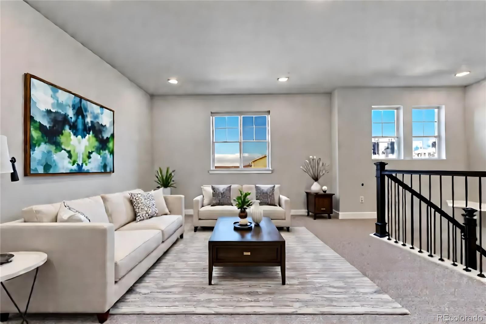 15902 Stringhalt Way Parker, CO 80134 - Photo 25 of 48 a living room with furniture and a couch