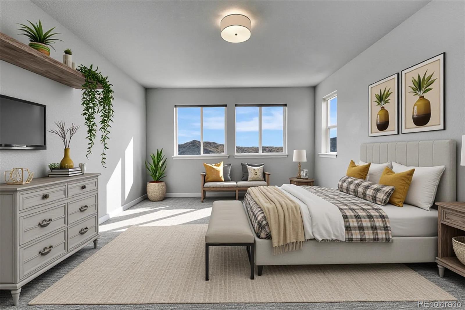 15902 Stringhalt Way Parker, CO 80134 - Photo 30 of 48 a bedroom with a large bed and a flat tv screen on dresser