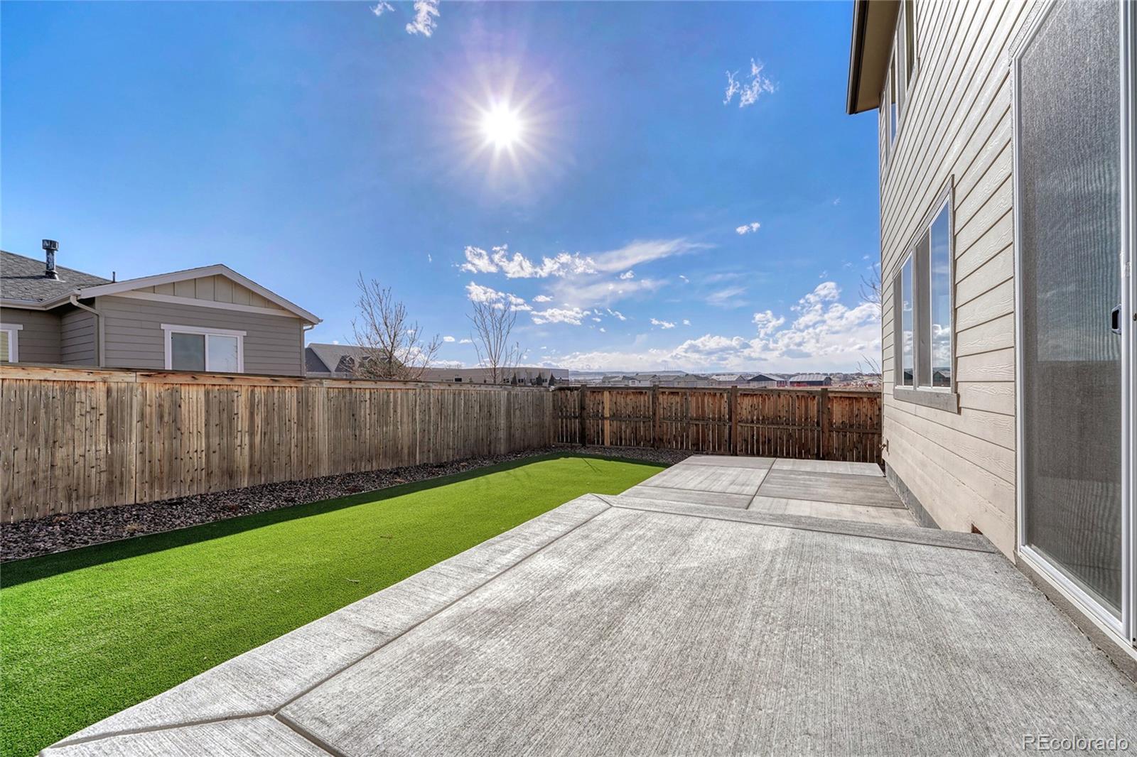 15902 Stringhalt Way Parker, CO 80134 - Photo 41 of 48 a view of back yard of the house