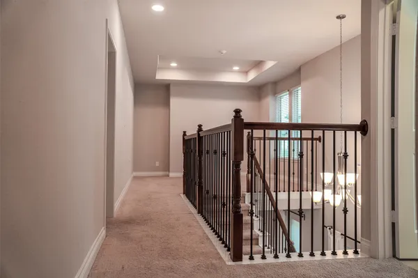 a view of hallway with stairs