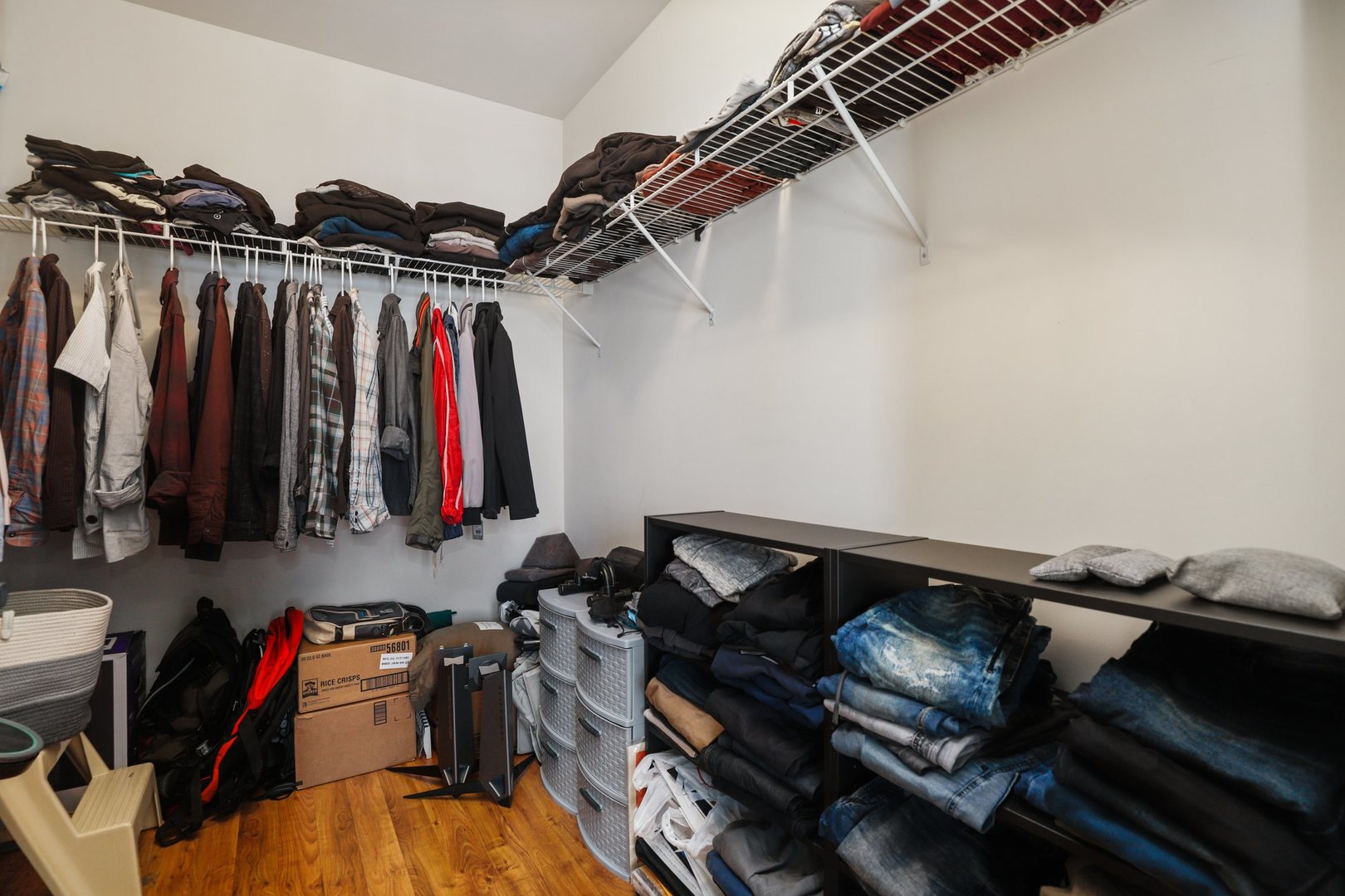 7243 Madison Street, Unit 421 Forest Park, IL 60130 - Photo 13 of 21 a view of walk in closet with clothes and shoes