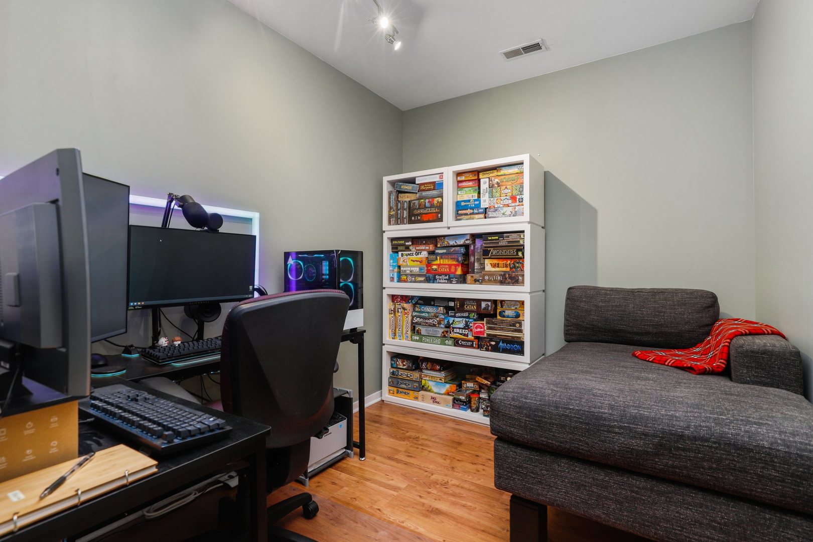 7243 Madison Street, Unit 421 Forest Park, IL 60130 - Photo 15 of 21 a bedroom with a bed and a flat screen tv