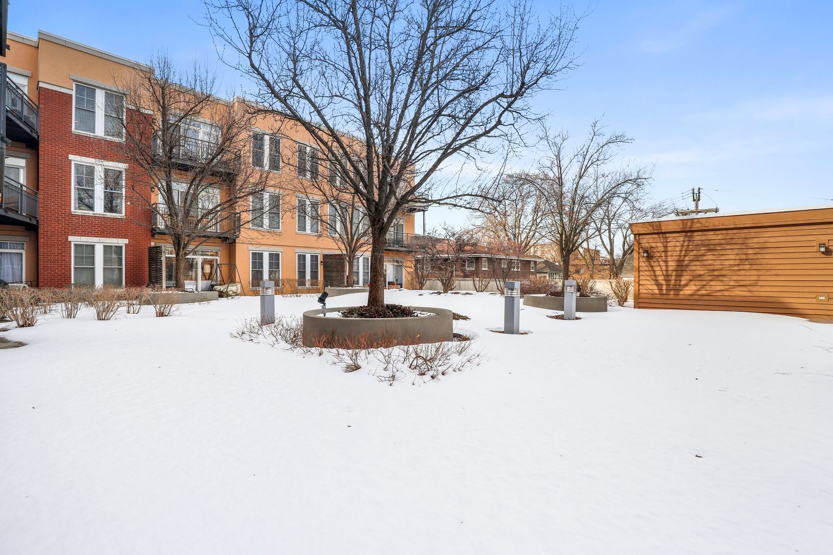 7243 Madison Street, Unit 421 Forest Park, IL 60130 - Photo 20 of 21 a street view covered with snow
