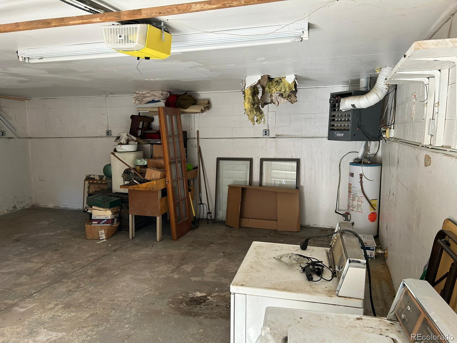 10881 Kitty Drive Conifer, CO 80433 - Photo 28 of 29 a view of storage and utility room with two chairs