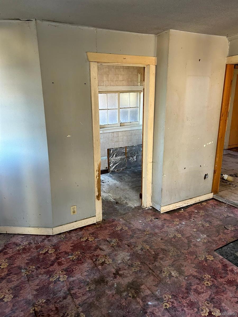 10881 Kitty Drive Conifer, CO 80433 - Photo 6 of 29 a view of an empty room