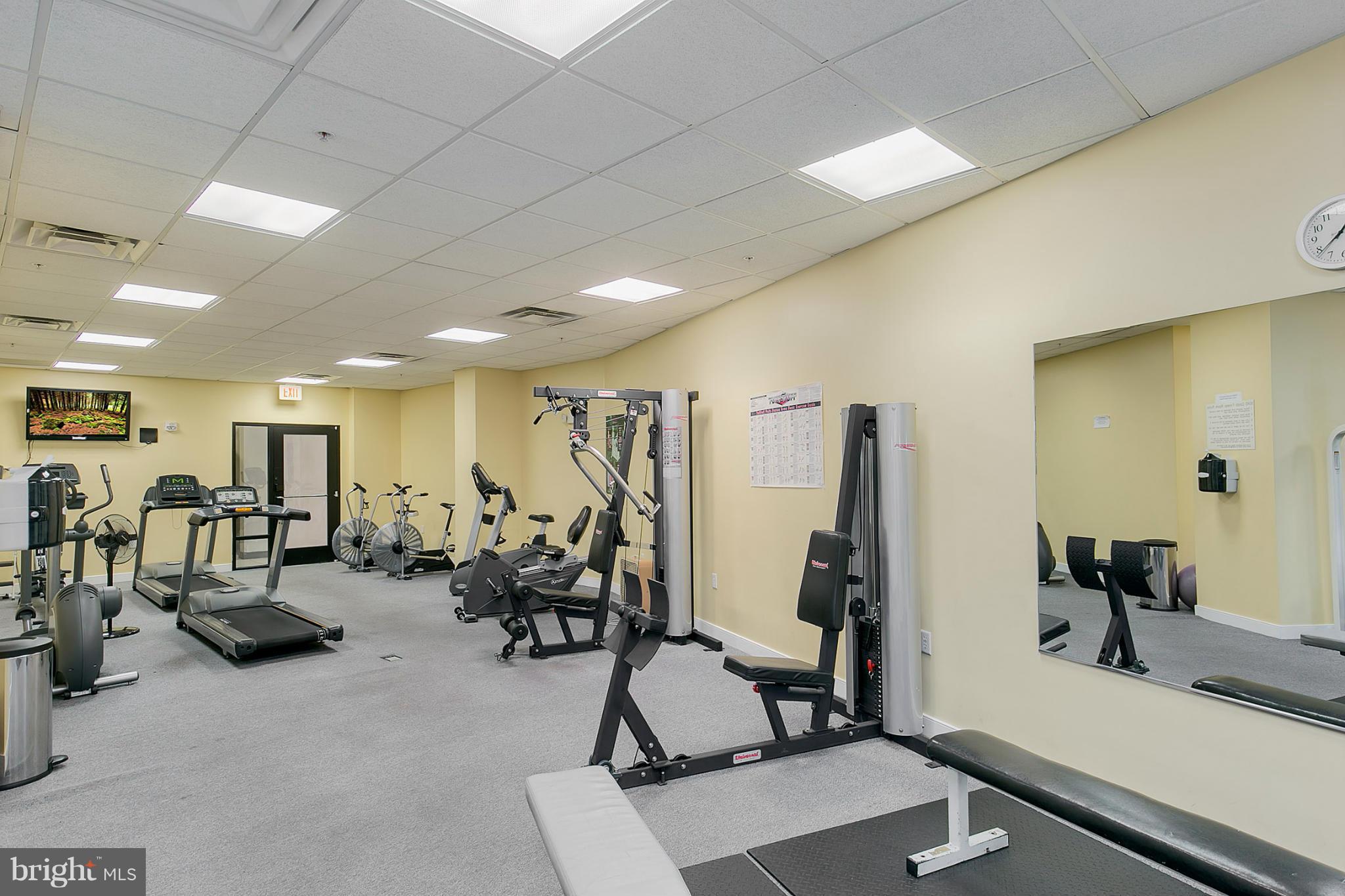 8045 Newell Street, Unit 513 Silver Spring, MD 20910 - Photo 19 of 21 a view of a room with gym equipment