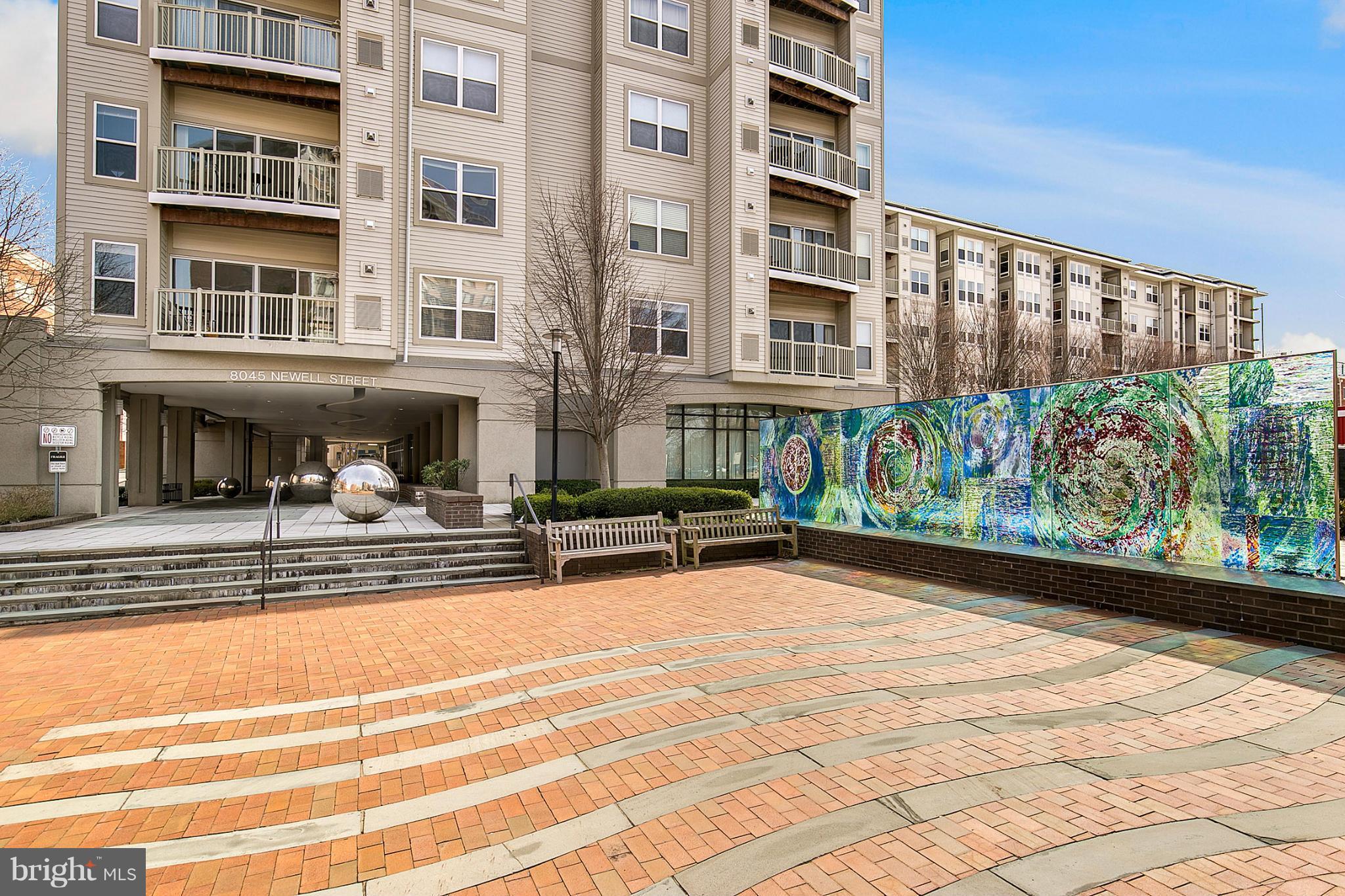 8045 Newell Street, Unit 513 Silver Spring, MD 20910 - Photo 21 of 21 a view of a building with a outdoor space