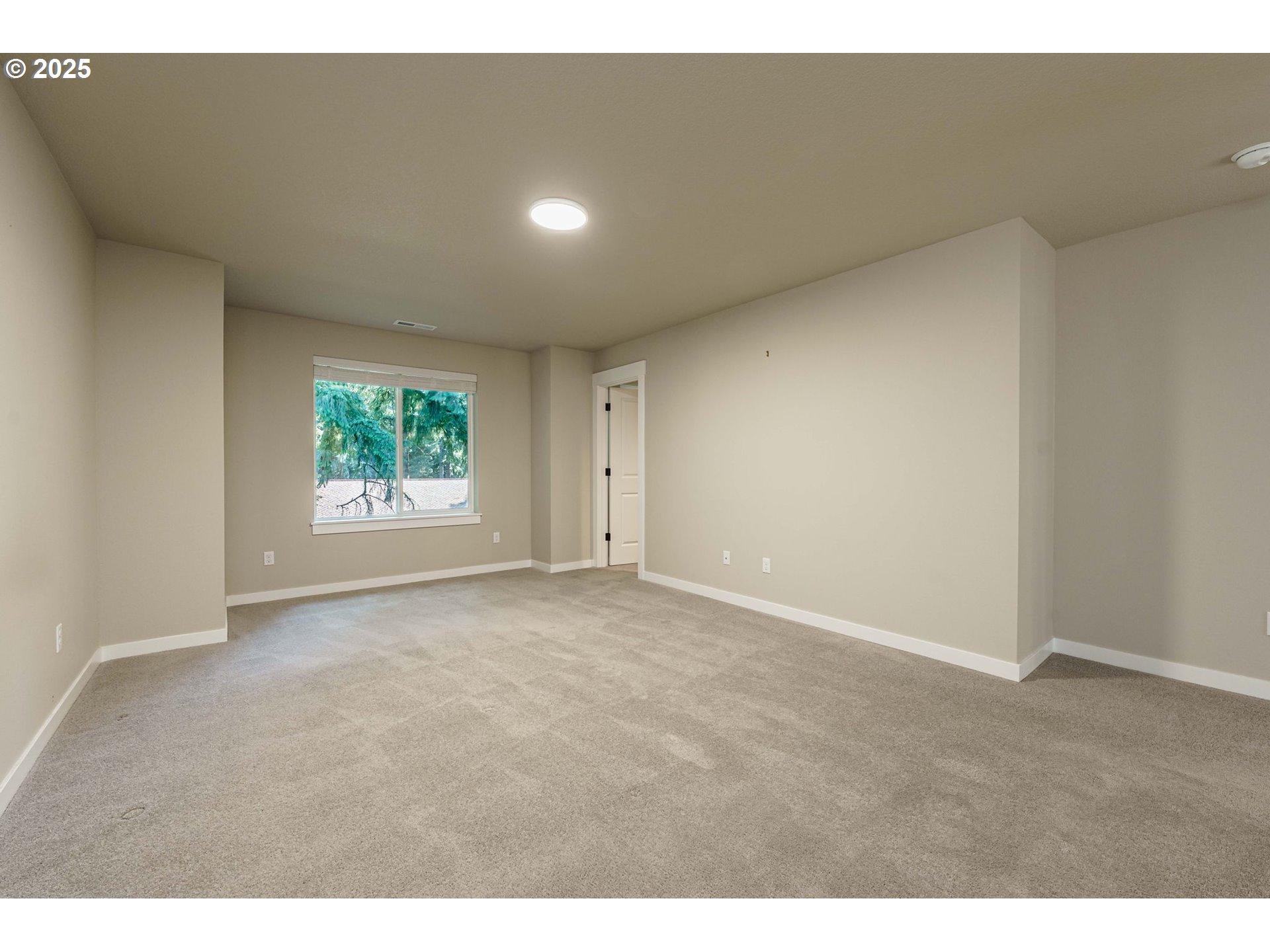 7135 South 13th Street Ridgefield, WA 98642 - Photo 20 of 40 a view of an empty room with a window
