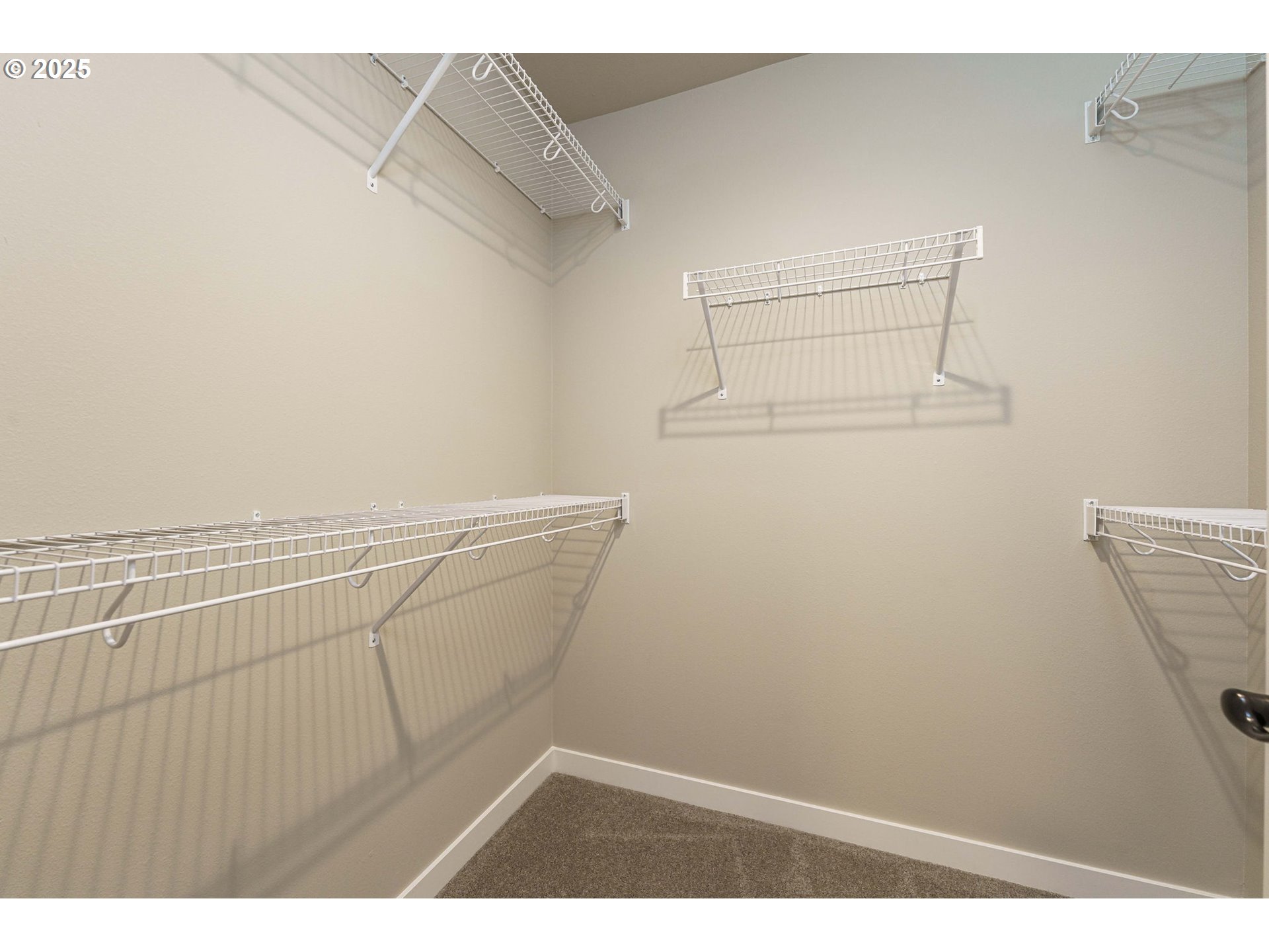 7135 South 13th Street Ridgefield, WA 98642 - Photo 33 of 40 a view of a room with racks on the wall