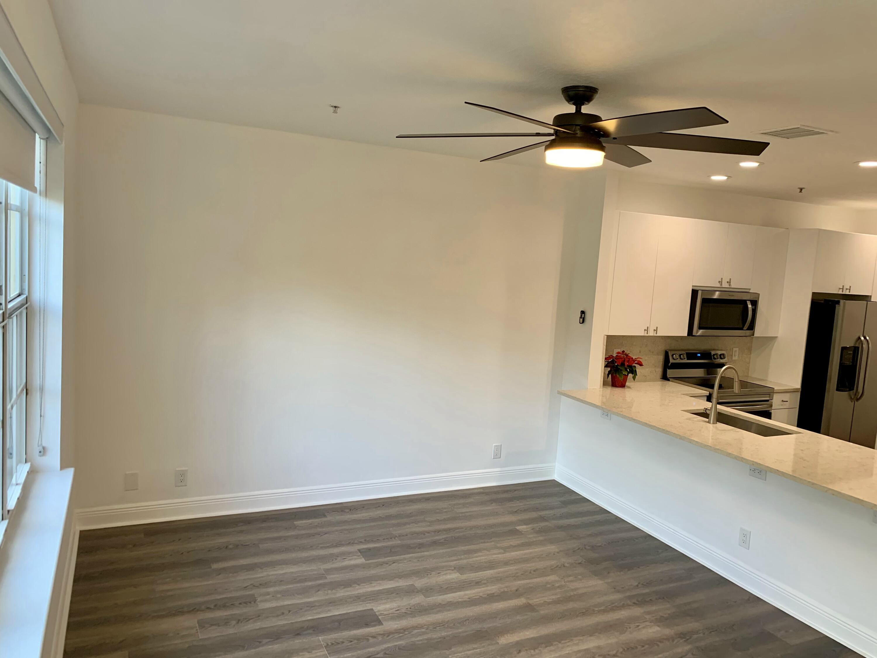 104 Jesup Lane Jupiter, FL 33458 - Photo 12 of 35 LIVING ROOM 1ST LEVEL