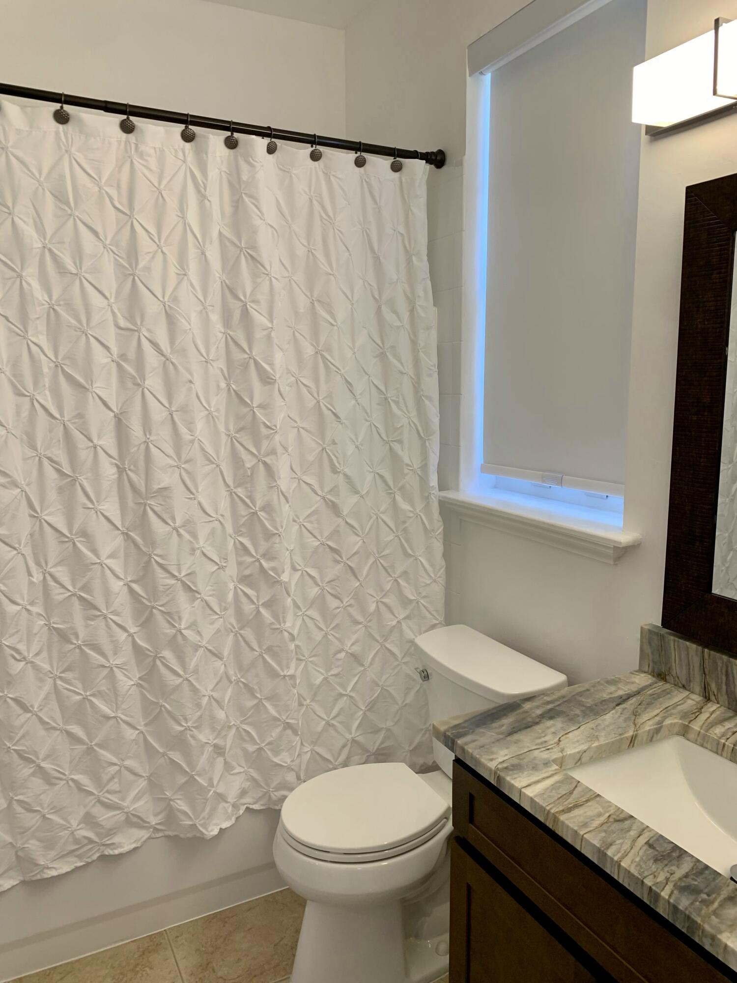 104 Jesup Lane Jupiter, FL 33458 - Photo 18 of 35 FULL BATH 1ST LEVEL