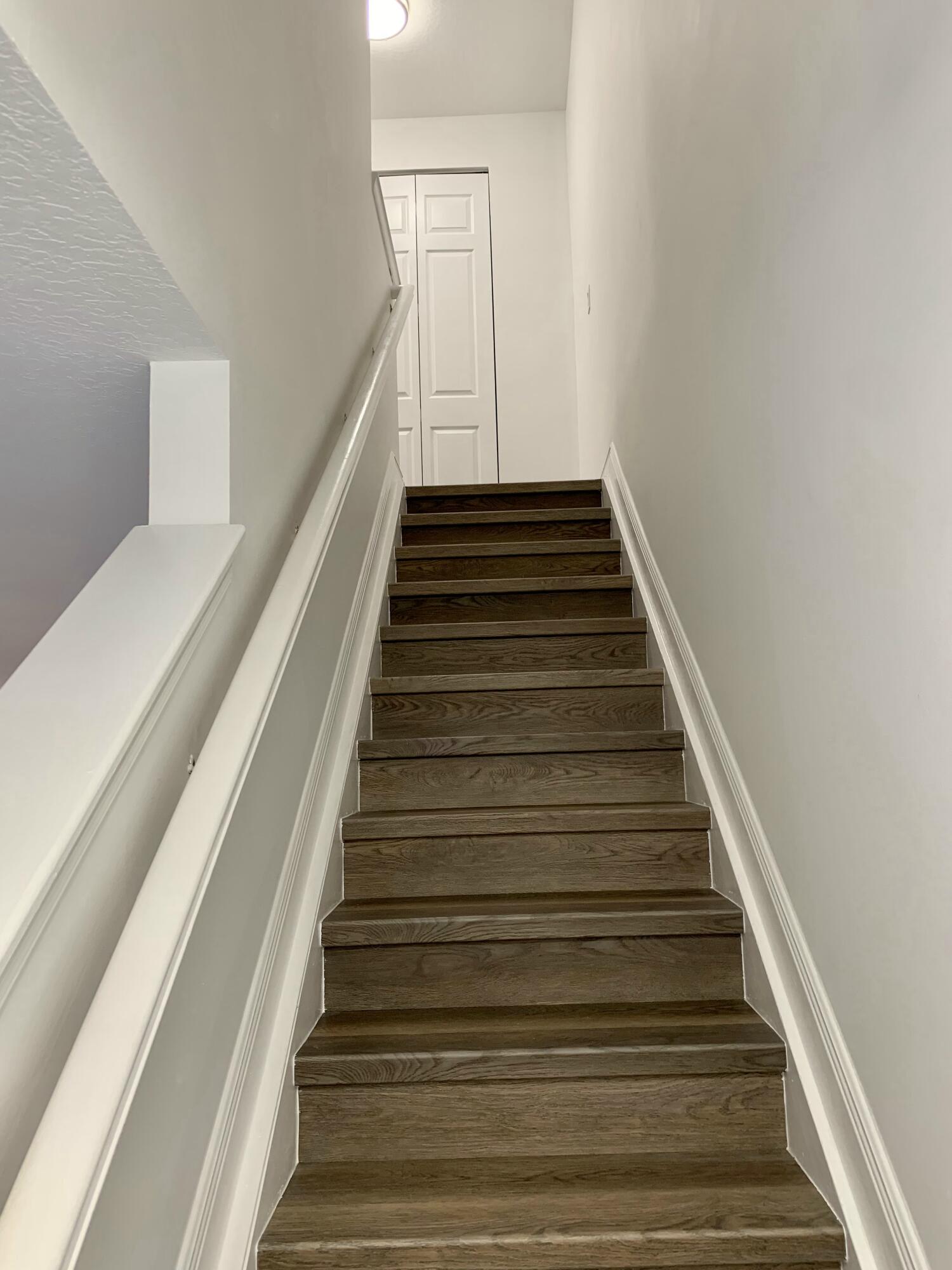 104 Jesup Lane Jupiter, FL 33458 - Photo 19 of 35 STAIRS TO 2ND LEVEL