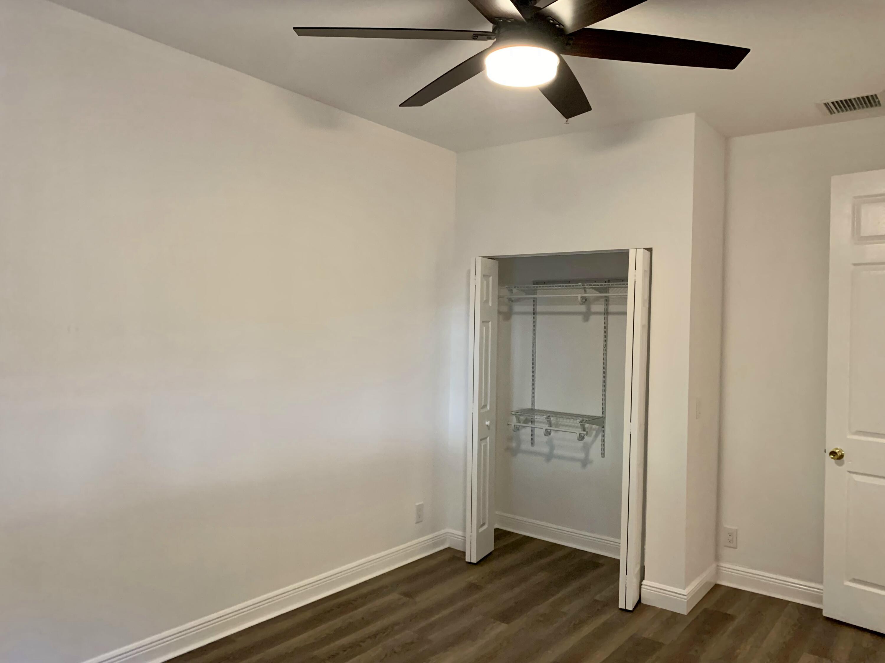 104 Jesup Lane Jupiter, FL 33458 - Photo 4 of 35 BEDROOM 1 MAIN LEVEL