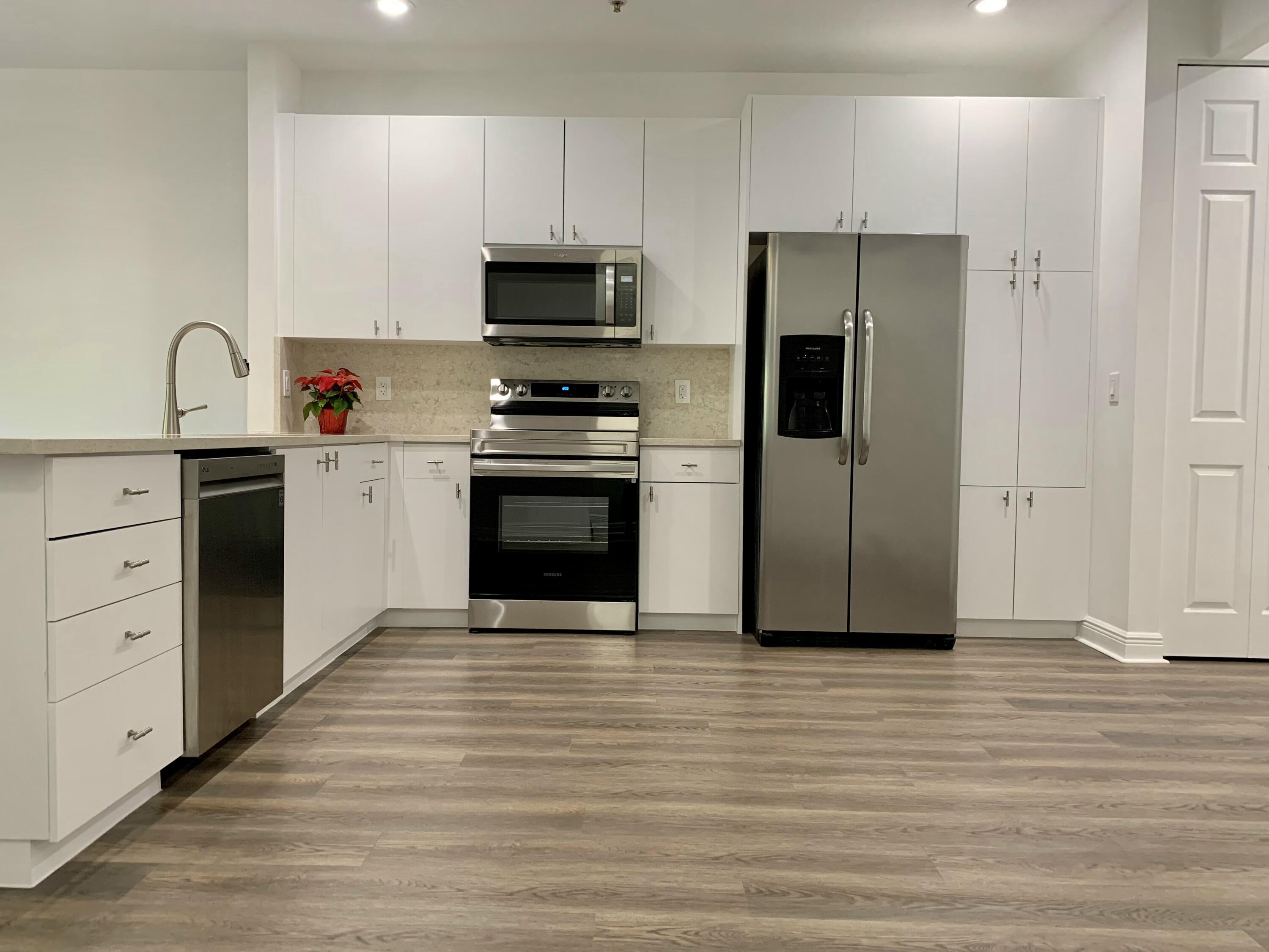 104 Jesup Lane Jupiter, FL 33458 - Photo 8 of 35 KITCHEN 1ST LEVEL