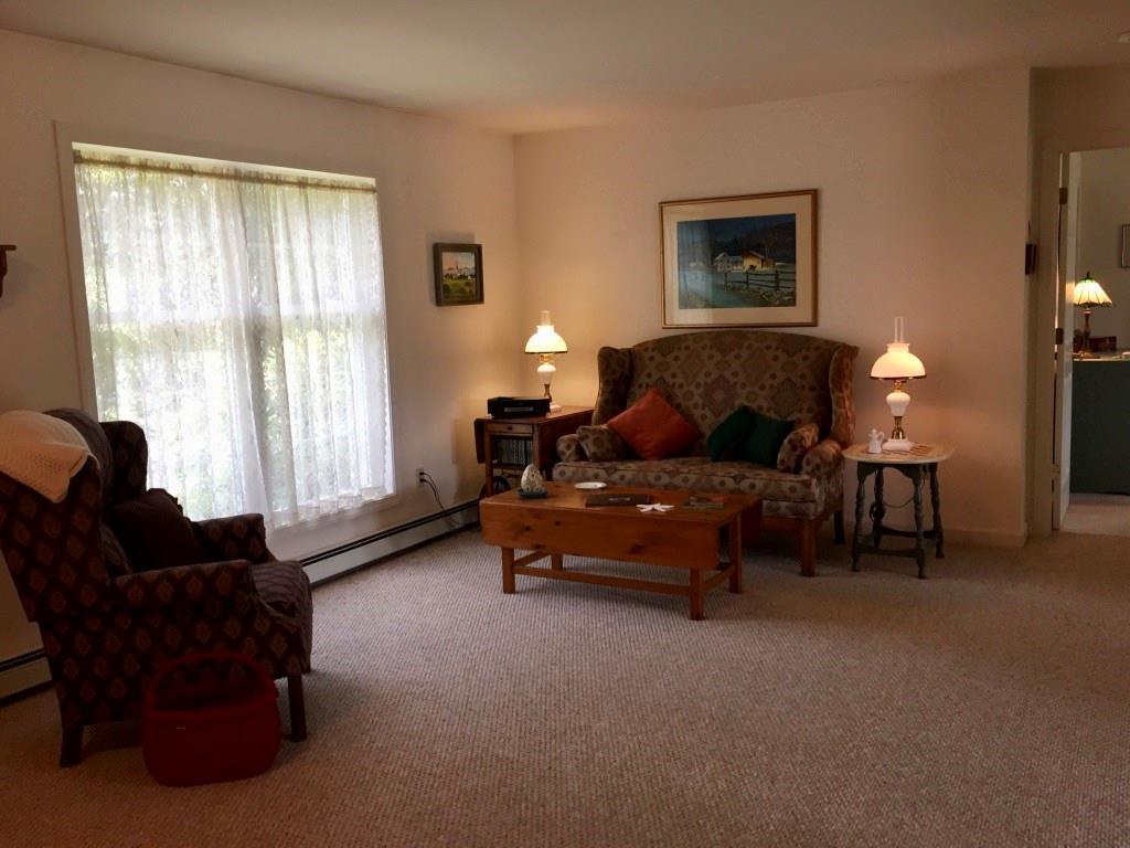 15 Spring Hill Farm Road Edgecomb, ME 04556 - Photo 13 of 34 Living room. Master bedroom suite is...