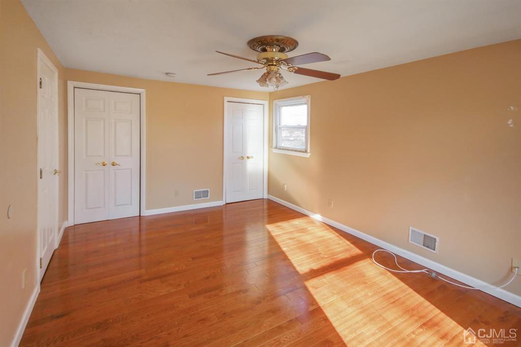 49 Racetrack Road East Brunswick, NJ 08816 - Photo 14 of 20 a view of an empty room and window