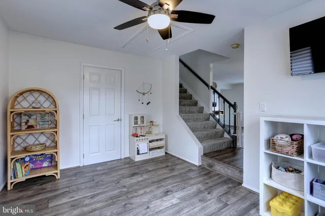 a living room with furniture and window