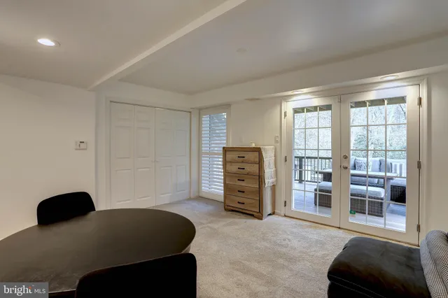 a room with a table and chairs