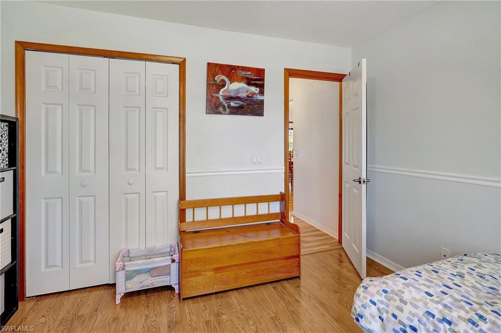 3520 2nd Avenue Northeast Naples, FL 34120 - Photo 24 of 39 a bedroom with a bed and a window