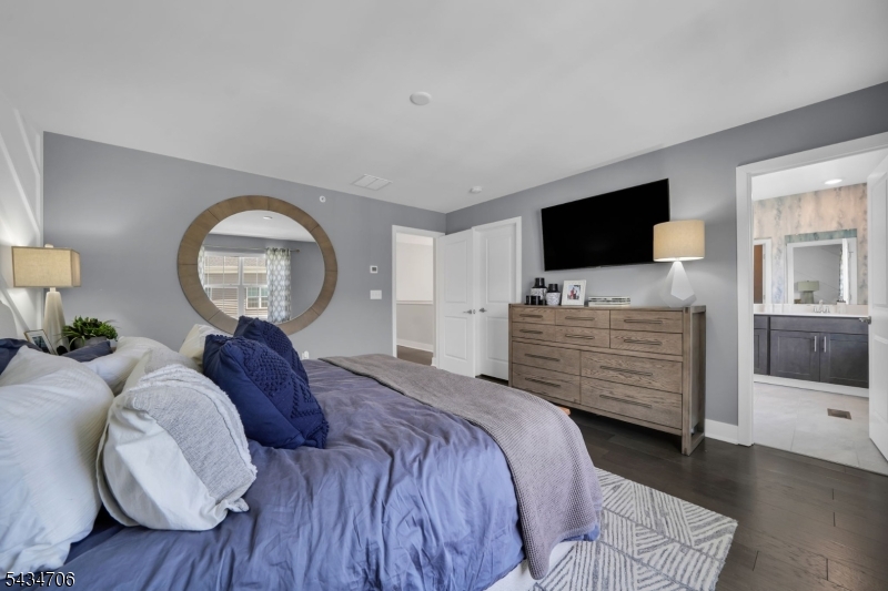 2 Doherty Way Morris Plains, NJ 07950 - Photo 22 of 33 a bedroom with a bed and a television