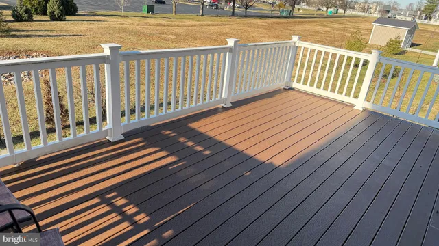 a view of a swimming pool with a yard