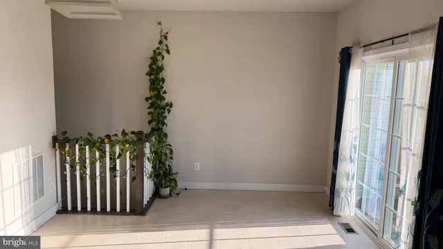 a view of a porch of a house