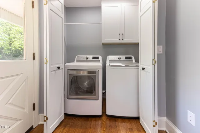 a utility room with dryer and washer