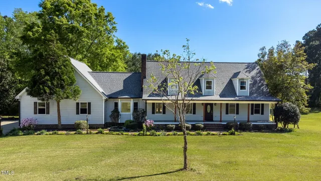 a view of a house with swimming pool