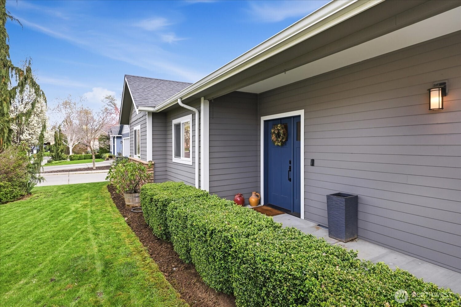 1855 Woodmere Loop Walla Walla, WA 99362 - Photo 17 of 22 a view of a backyard with potted plants