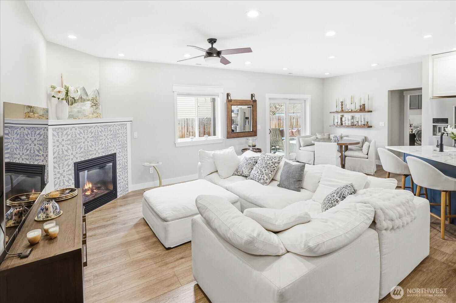 1855 Woodmere Loop Walla Walla, WA 99362 - Photo 2 of 22 a living room with furniture fireplace and a table
