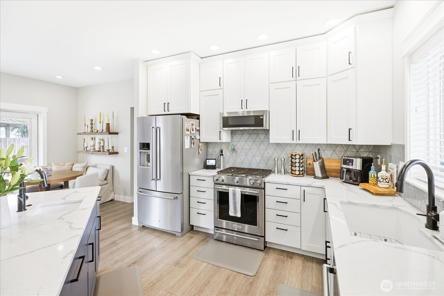 1855 Woodmere Loop Walla Walla, WA 99362 - Photo 5 of 22 a kitchen with stainless steel appliances a refrigerator sink and cabinets