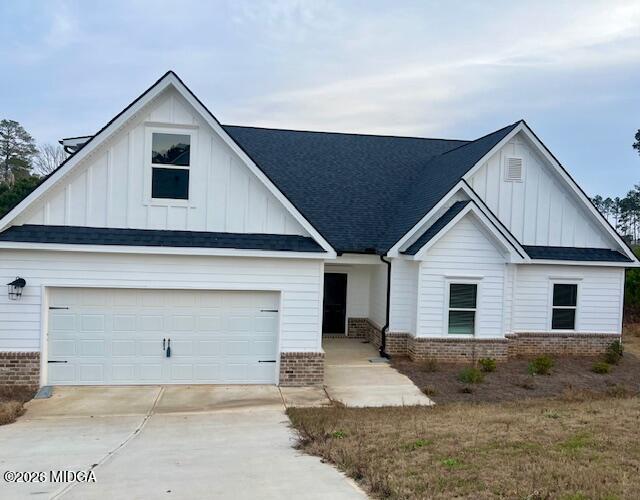 228 Trellis Walk Macon, GA 31220 - Photo 1 of 22 a view of a house with a yard and garage