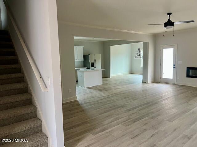228 Trellis Walk Macon, GA 31220 - Photo 3 of 22 a view of a hallway view with wooden floor and staircase