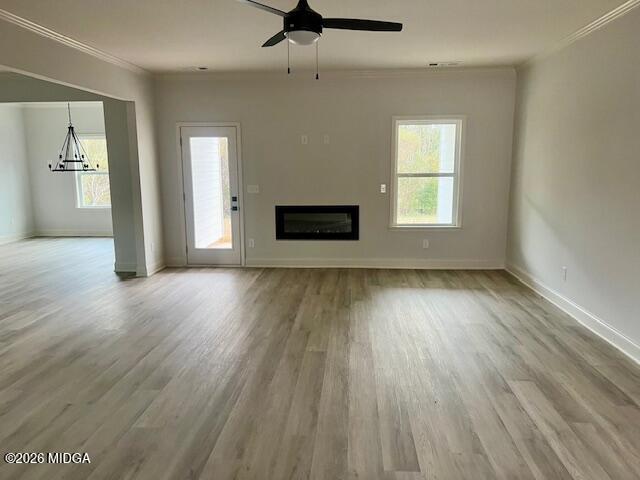 228 Trellis Walk Macon, GA 31220 - Photo 5 of 22 wooden floor in an empty room with a window
