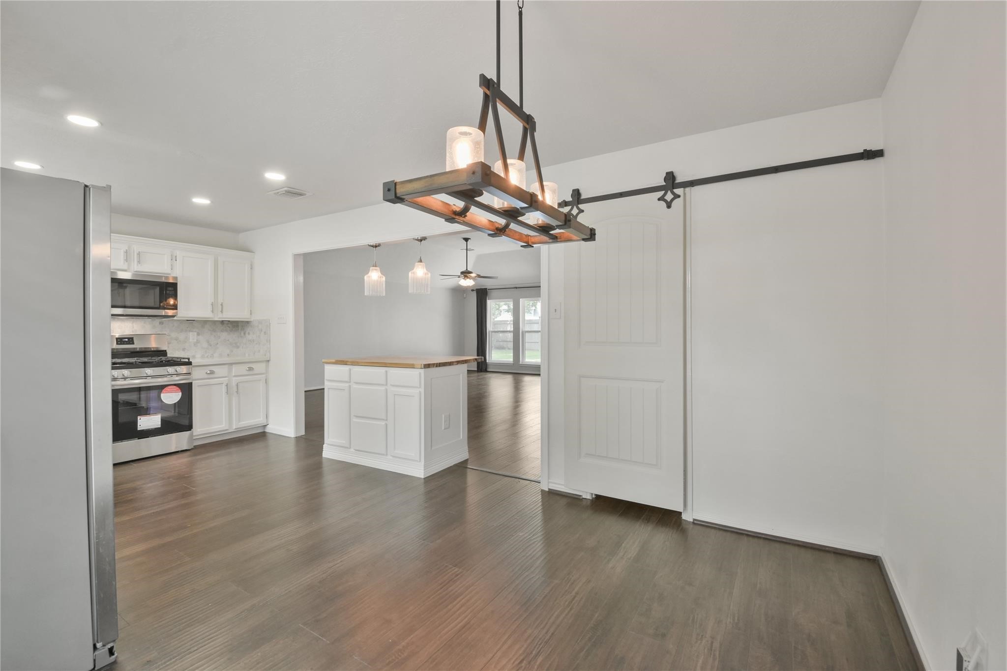 5014 Temple Bell Drive Spring, TX 77388 - Photo 15 of 30 Barn door in breakfast room