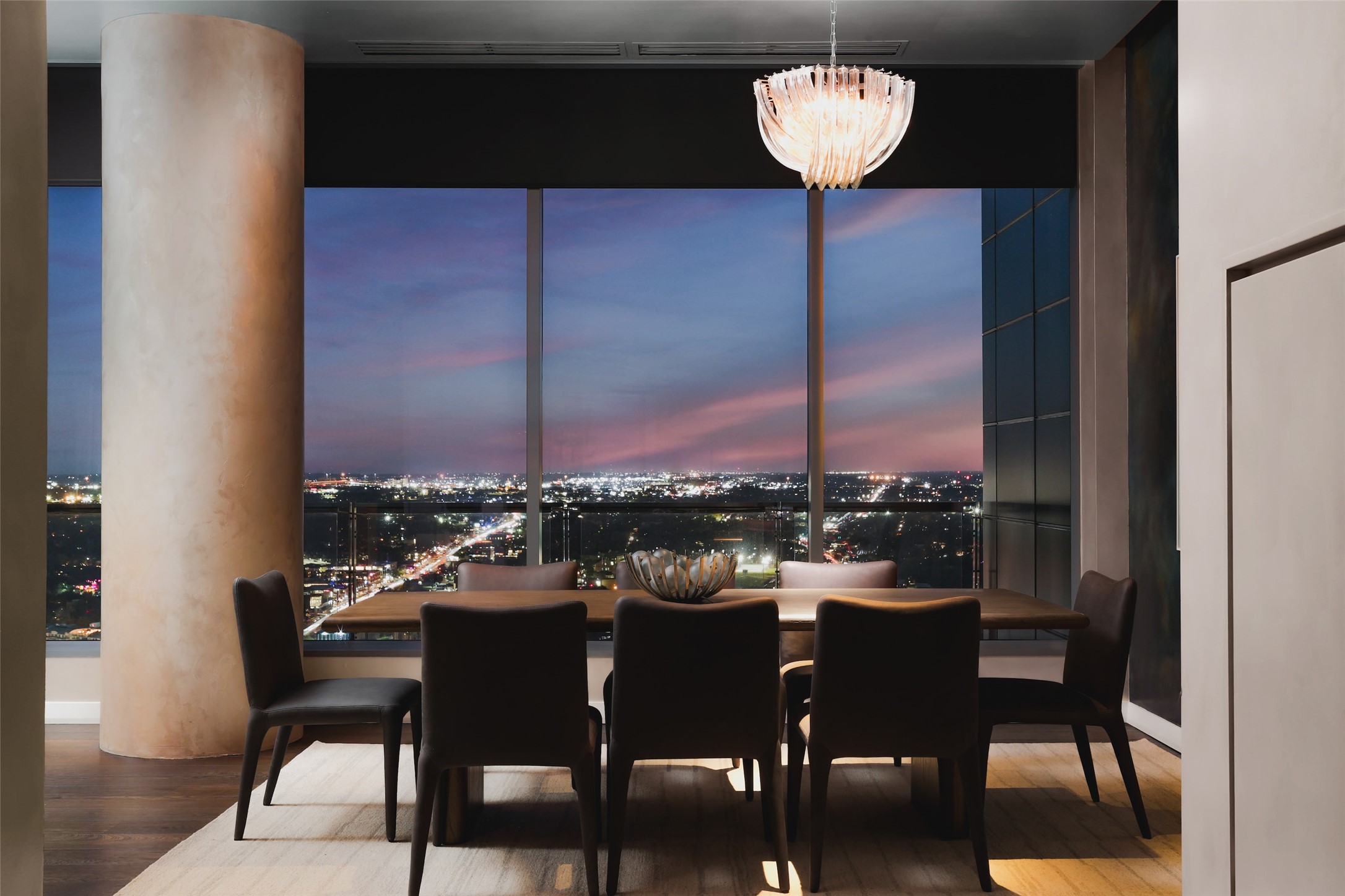 210 Lavaca Street, Unit 3601 Austin, TX 78701 - Photo 11 of 36 a view of a dining room with furniture and wooden floor