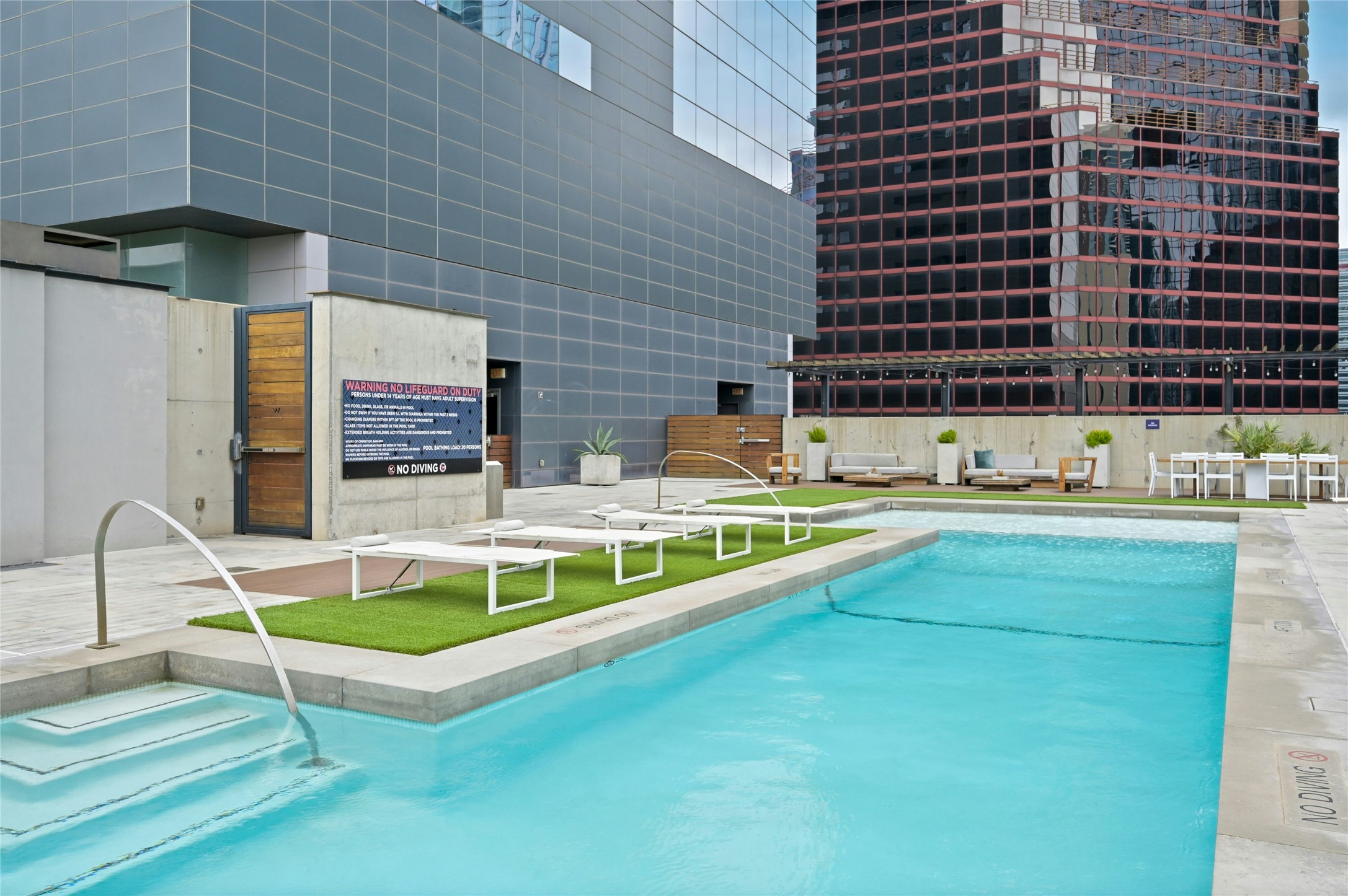 210 Lavaca Street, Unit 3601 Austin, TX 78701 - Photo 35 of 36 a view of a swimming pool with a patio