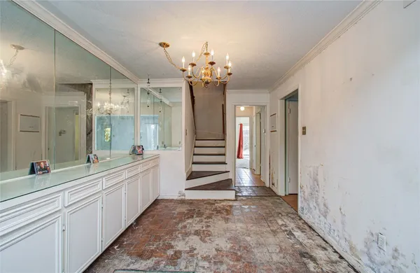 a spacious bathroom with a double vanity sink and a mirror