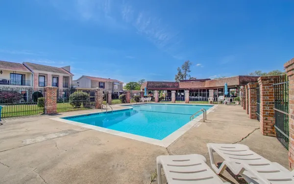 a view of an ocean with swimming pool and seating