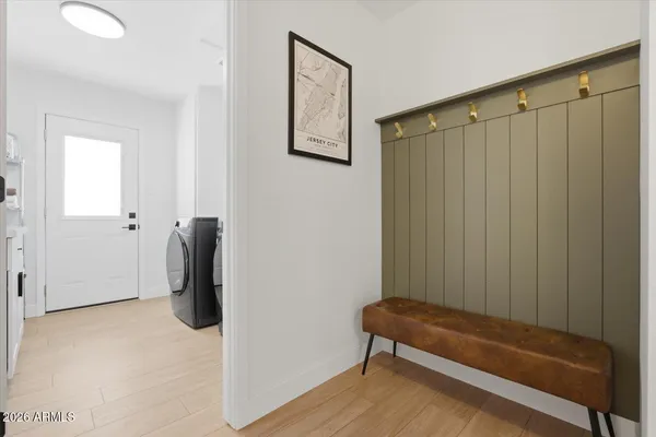 a bathroom with a sink and mirror