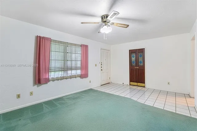 a view of an empty room with window