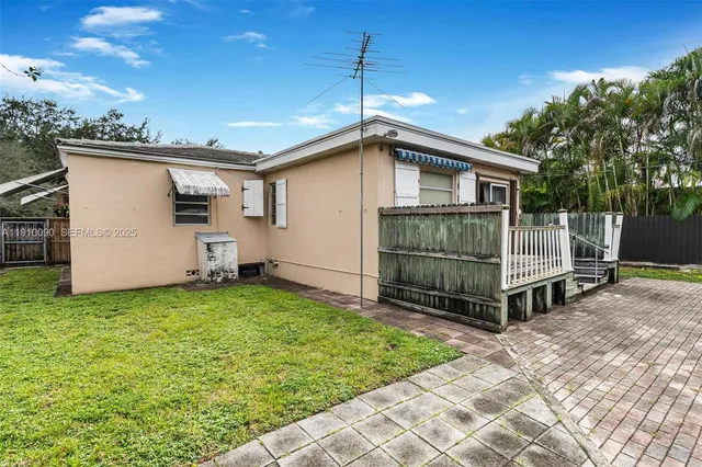 a house view with a garden space