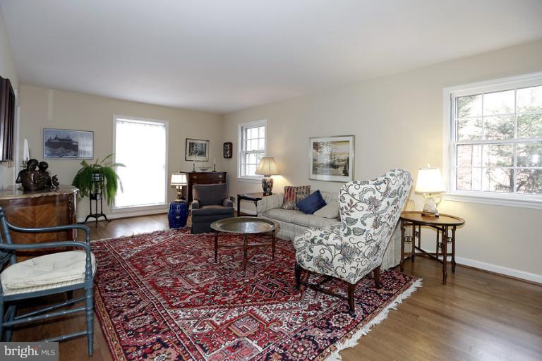 7613 Sebago Road Bethesda, MD 20817 - Photo 14 of 26 a living room with furniture and a window