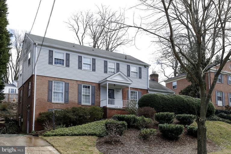7613 Sebago Road Bethesda, MD 20817 - Photo 26 of 26 a front view of a house with garden