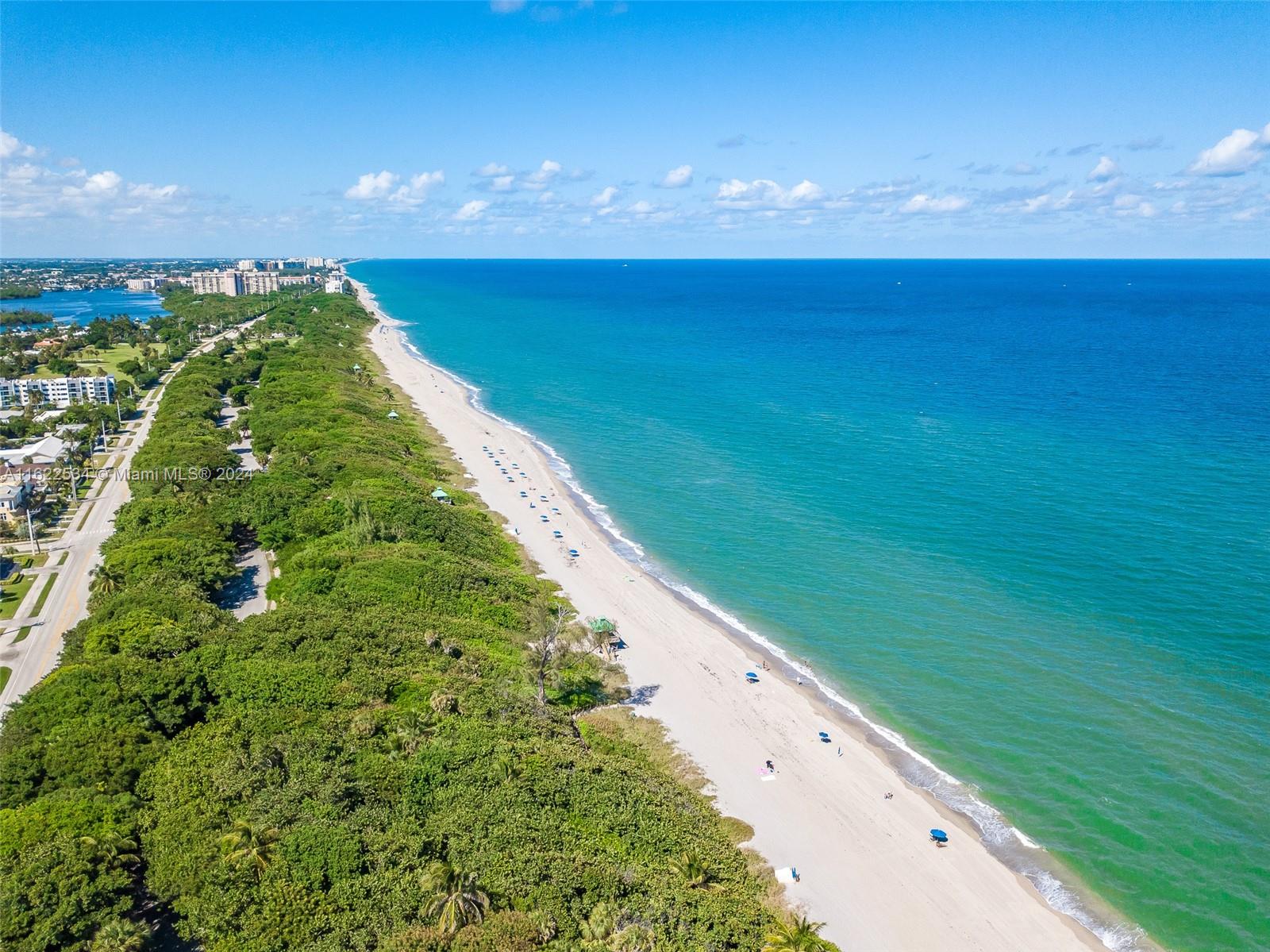 160 Northeast Wavecrest Court Boca Raton, FL 33432 - Photo 13 of 52 a view of an ocean and a yard